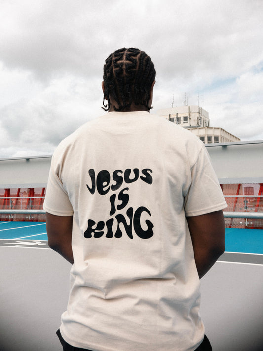 JESUS IS KING PREMIUM TEE | SAND / BLACK